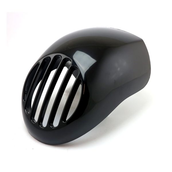 Upper headlamp fly fairing with integrated headlamp grill